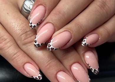 Stylish leopard print nail art at Sculpture Tech Lash and Nail Artistry, Kingsburgh, Kwazulu-natal, ZA.