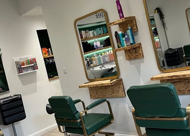 Modern salon styling chairs at Eom Hair at Salon 29, Saffron Walden, England, GB.