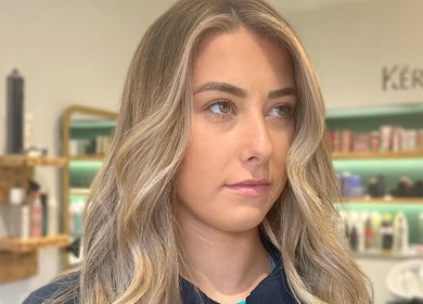 Model with blonde waves at Eom Hair at Salon 29, Saffron Walden, England, GB.