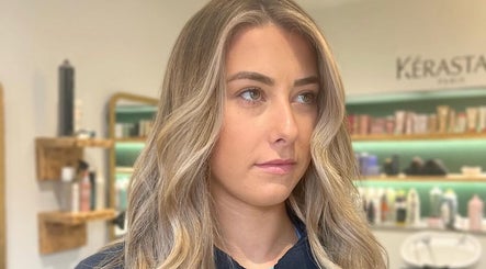 Model with blonde waves at Eom Hair at Salon 29, Saffron Walden, England, GB.