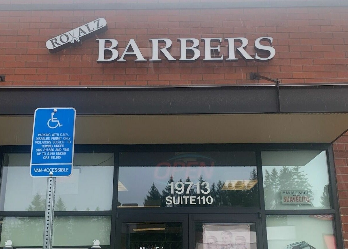 Royalz Barbers exterior in Oregon City, Oregon, US, showcasing the welcoming entrance and signage.