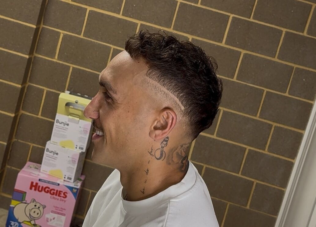 Man with a stylish fade haircut at FLETCHCUTZ, Woodvale, Western Australia, AU.