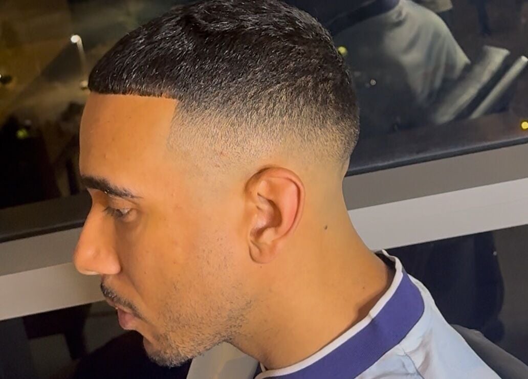 Sharp fade haircut at FLETCHCUTZ in Woodvale, Western Australia, AU, showcasing expert barbering skills.