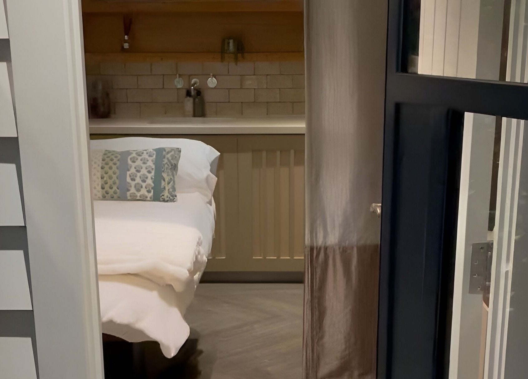 Inviting relaxation room at Living Well Reflexology, Mickleton, England, GB. Features cozy bed and peaceful decor.