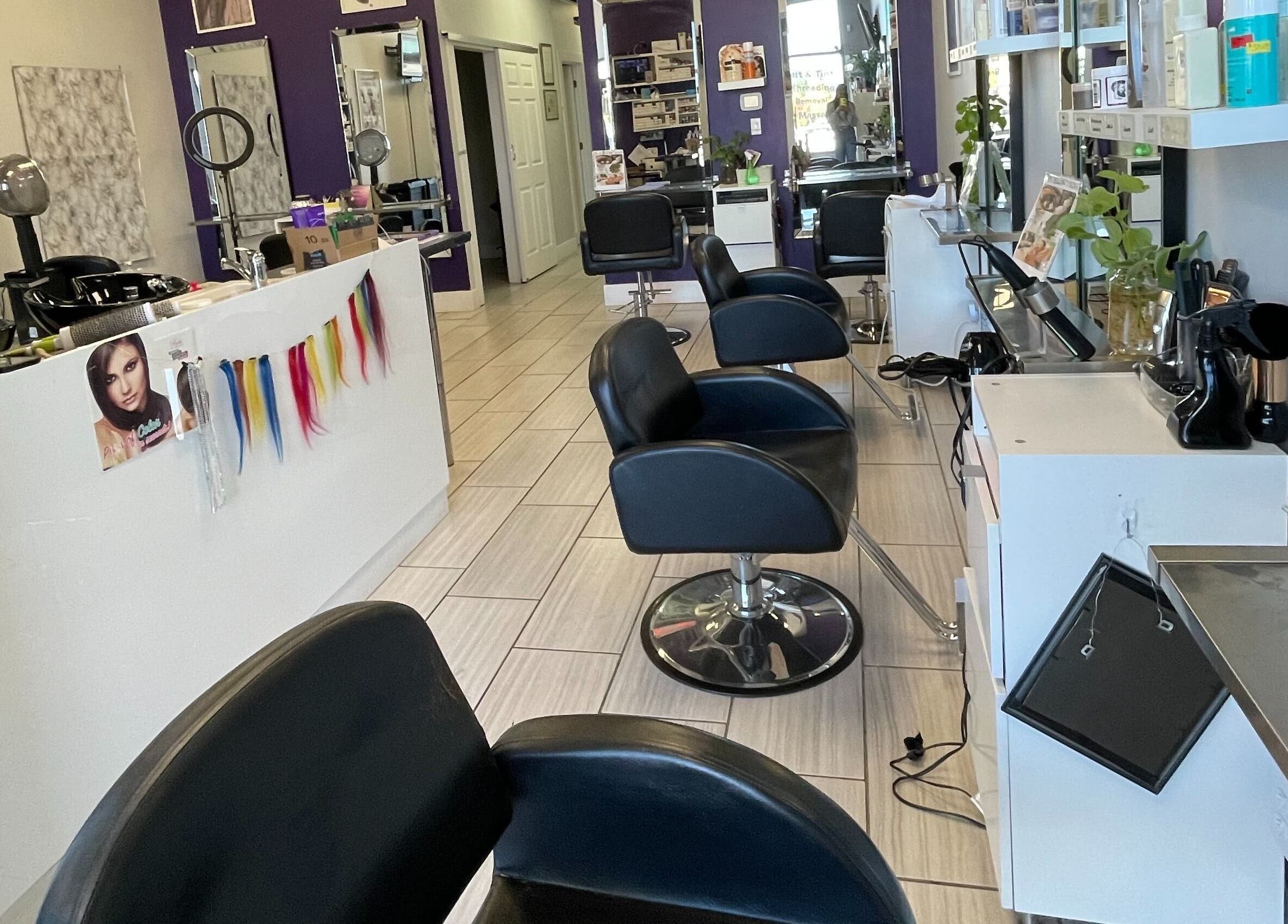 Modern salon chairs and styling stations at Si Salon and Spa, Edmonton, Alberta, CA.