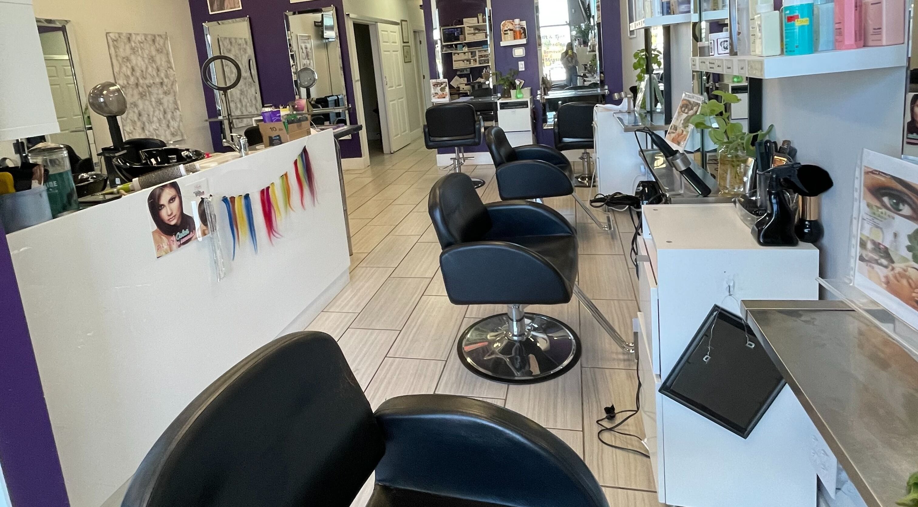 Modern salon chairs and styling stations at Si Salon and Spa, Edmonton, Alberta, CA.