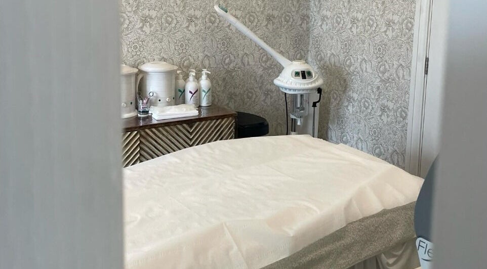 Serene treatment room at Cocoon Bristol featuring a cozy massage table - Bristol, England, GB.