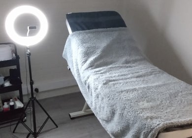 Tanning room at Sunkissed Tanning & Beauty in Ballymoney, Northern Ireland, GB, equipped with a modern ring light.