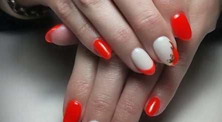 Stylish red and white nail art at Demure Nails by Maylene, Kariega, Eastern Cape, ZA.