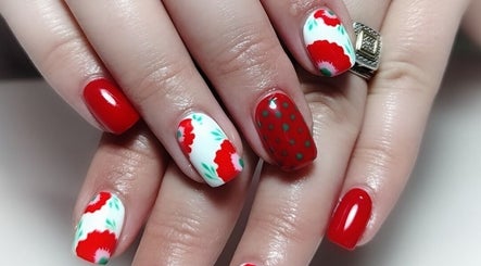Elegant red and floral nail art at Demure Nails by Maylene, Kariega, Eastern Cape, ZA.