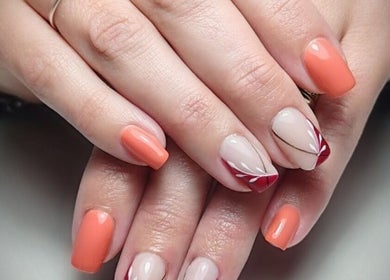 Elegant orange and red nail art at Demure Nails by Maylene, Kariega, Eastern Cape, ZA.