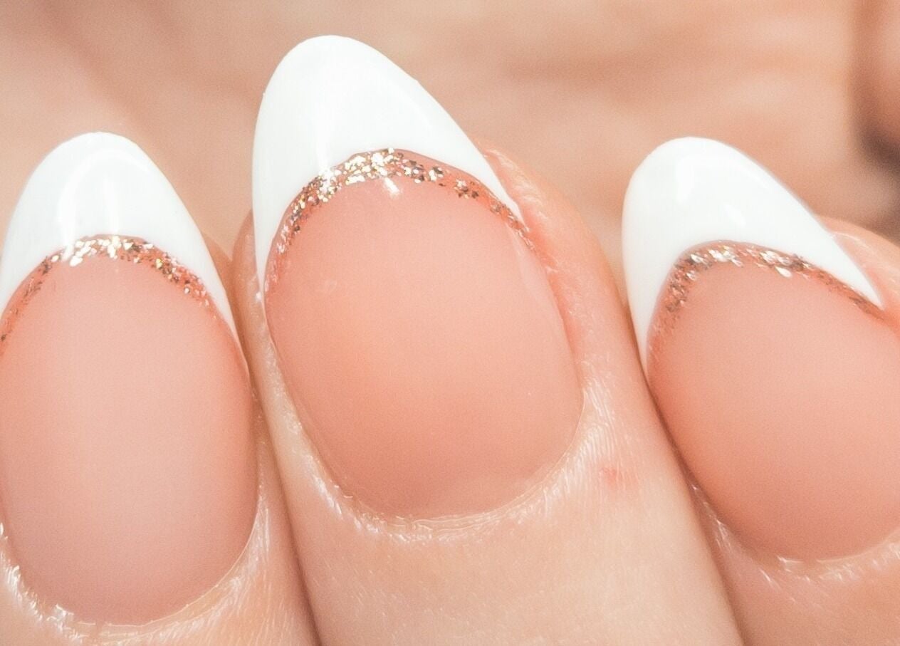 Elegant French nails with glitter design at KMC Nail Studio, Wanneroo, Western Australia, AU.