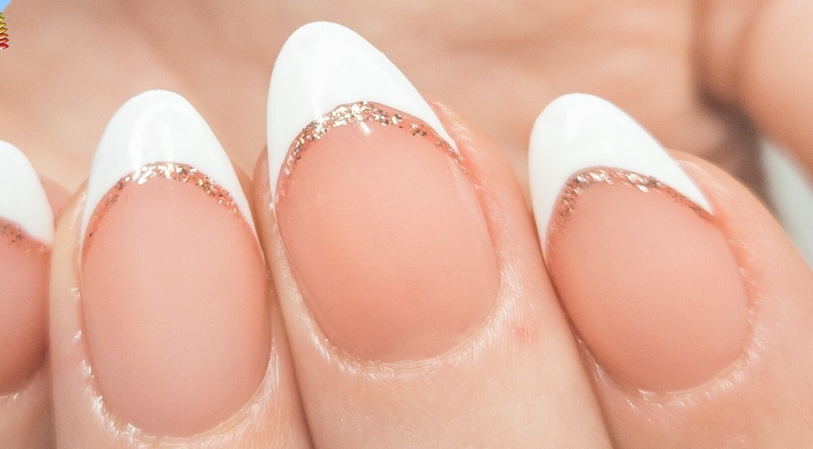 Elegant French nails with glitter design at KMC Nail Studio, Wanneroo, Western Australia, AU.