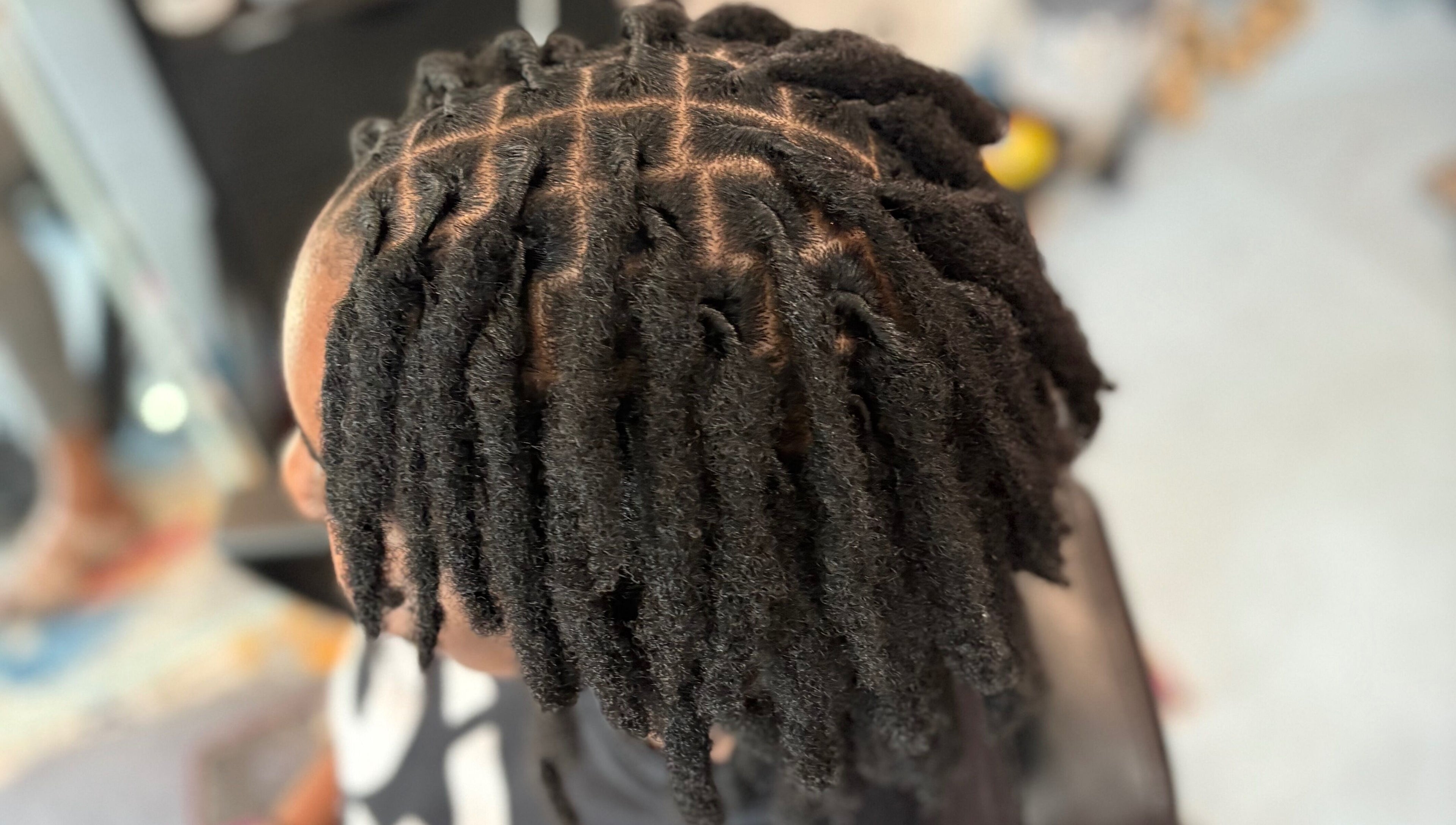 Close-up of newly styled locs at Loc’d N Loaded in Philadelphia, Pennsylvania, US.