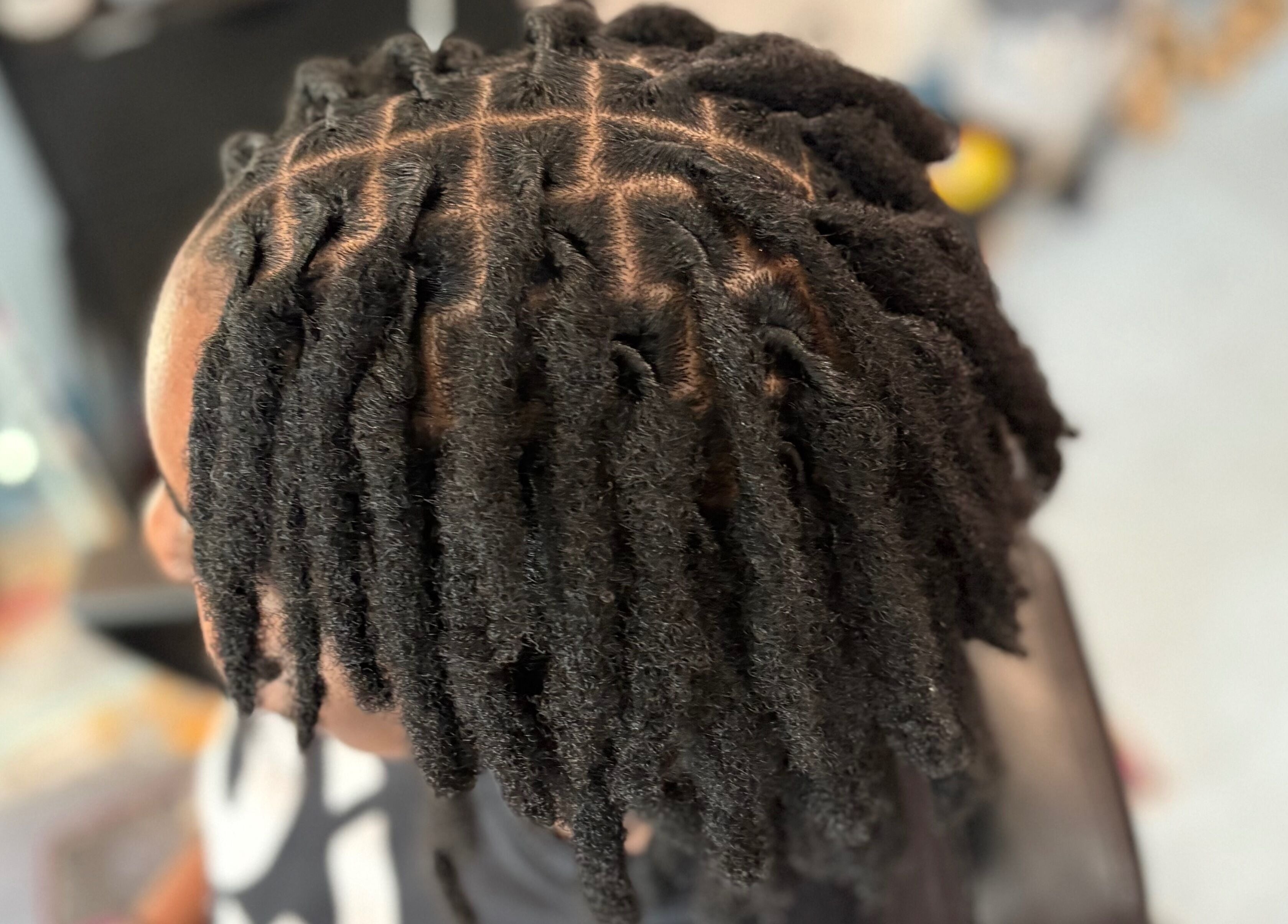 Close-up of newly styled locs at Loc’d N Loaded in Philadelphia, Pennsylvania, US.