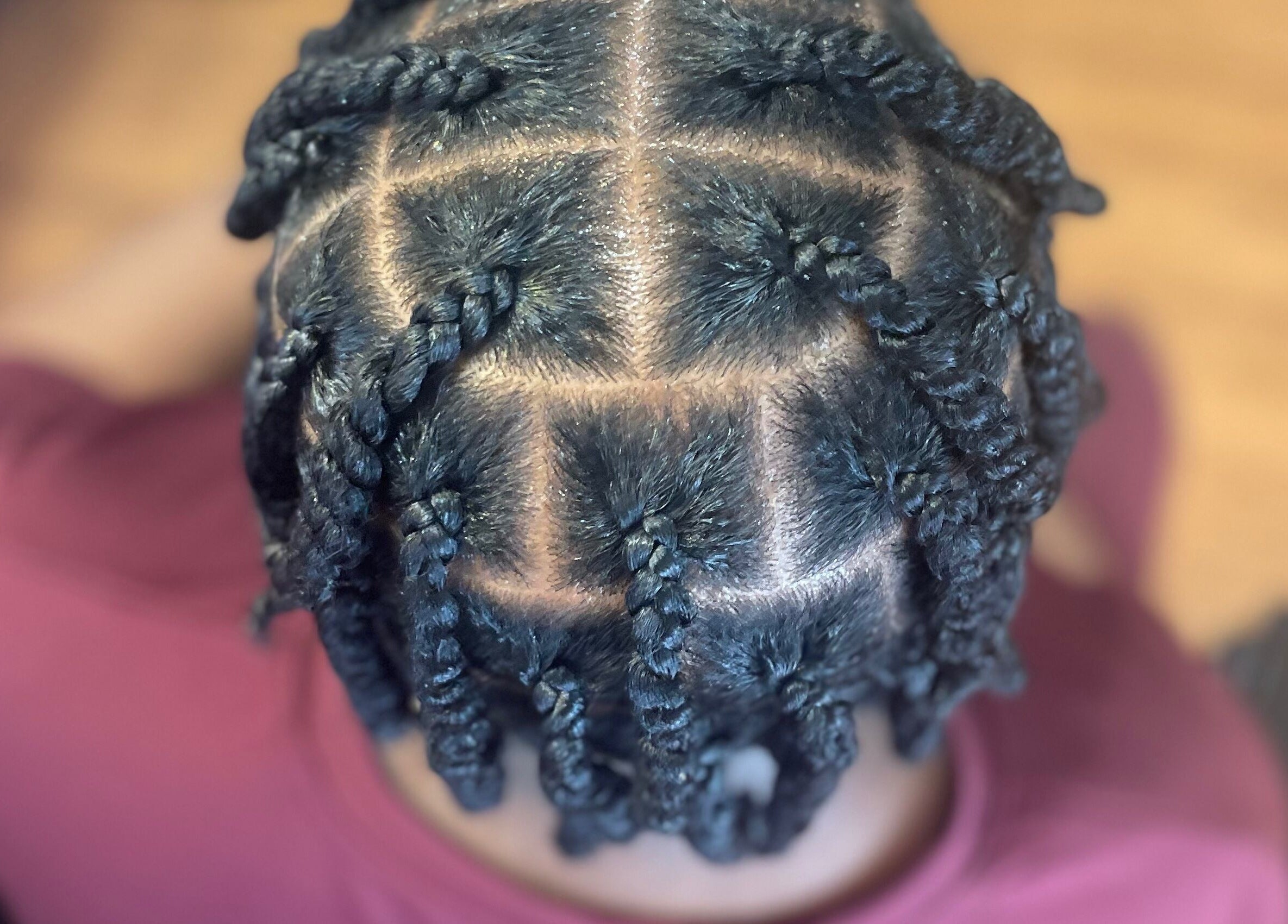 Loc’d N Loaded offers stunning braid styles in Philadelphia, Pennsylvania, US, showcasing intricate braid design.