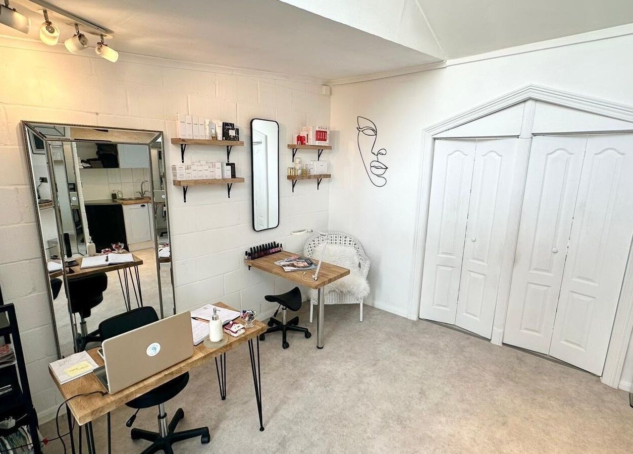 Peaceful beauty room at Facial Attraction, London, England, GB showcasing sleek design and cozy ambiance.