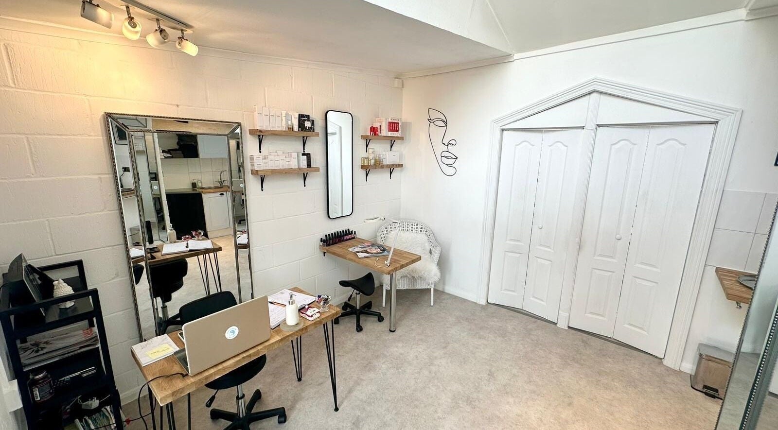 Peaceful beauty room at Facial Attraction, London, England, GB showcasing sleek design and cozy ambiance.