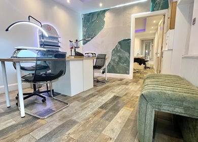 Modern nail salon area at Unique To You in Edinburgh, Scotland, GB with chic decor and ample lighting.