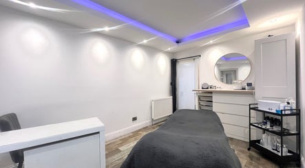 Relax in the serene treatment room at Unique To You, Edinburgh, Scotland, GB, for a personalized wellness experience.