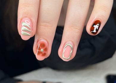 Close-up of modern nail art at Unique To You, Edinburgh, Scotland, GB highlighting creative designs.