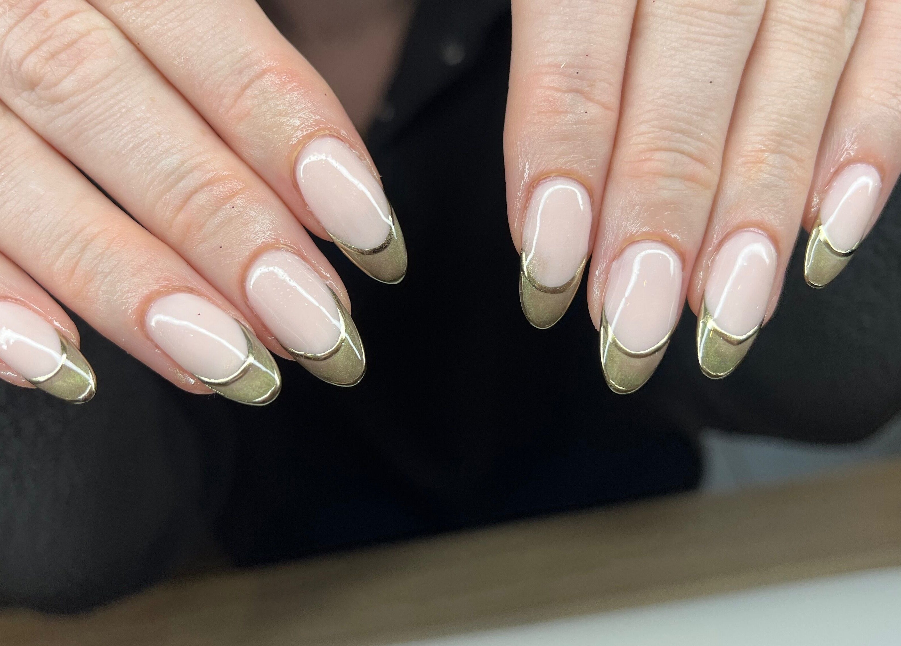 Elegant golden French manicure at Unique To You in Edinburgh, Scotland, GB. Perfect for stylish individuals.