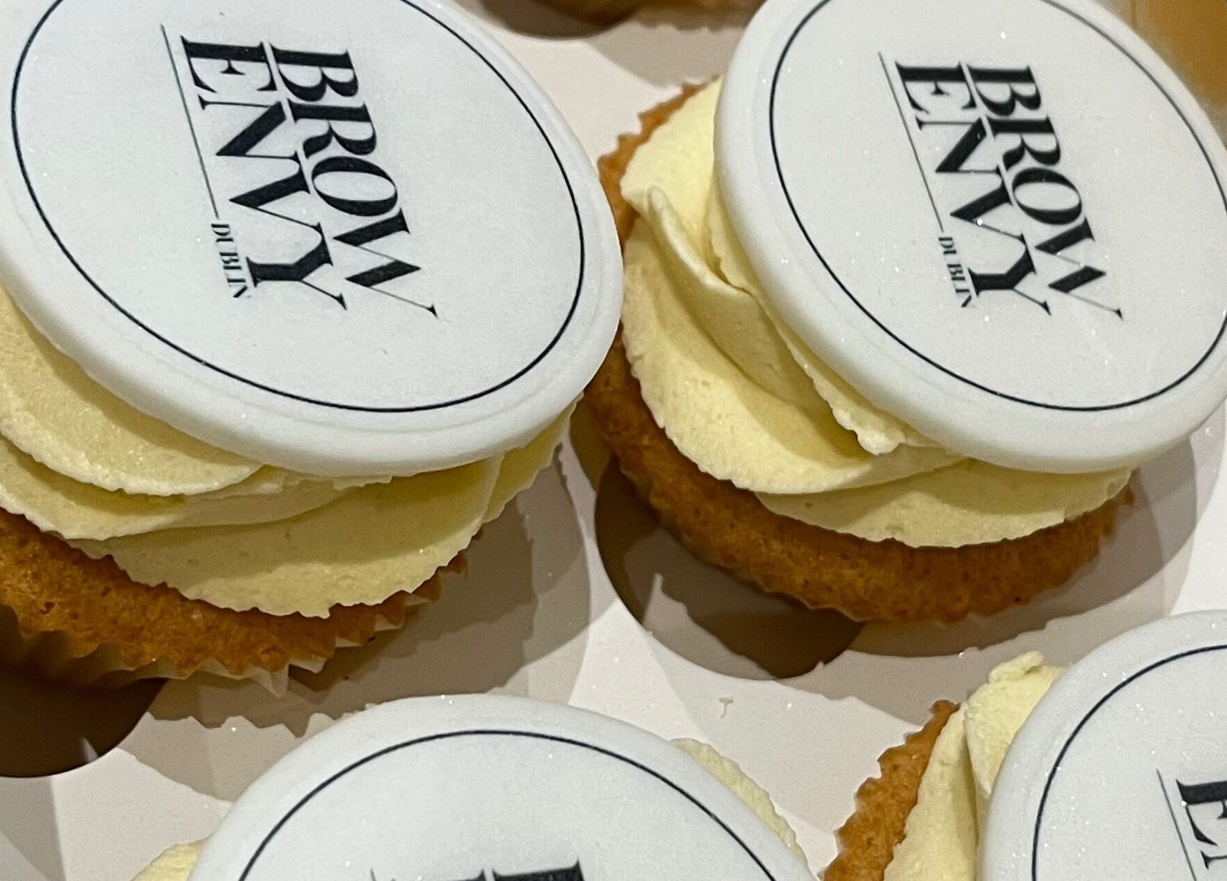 Cupcakes with Brow Envy logo at Brow Envy, Dublin, County Dublin, IE. Delicious treats for beauty enthusiasts.