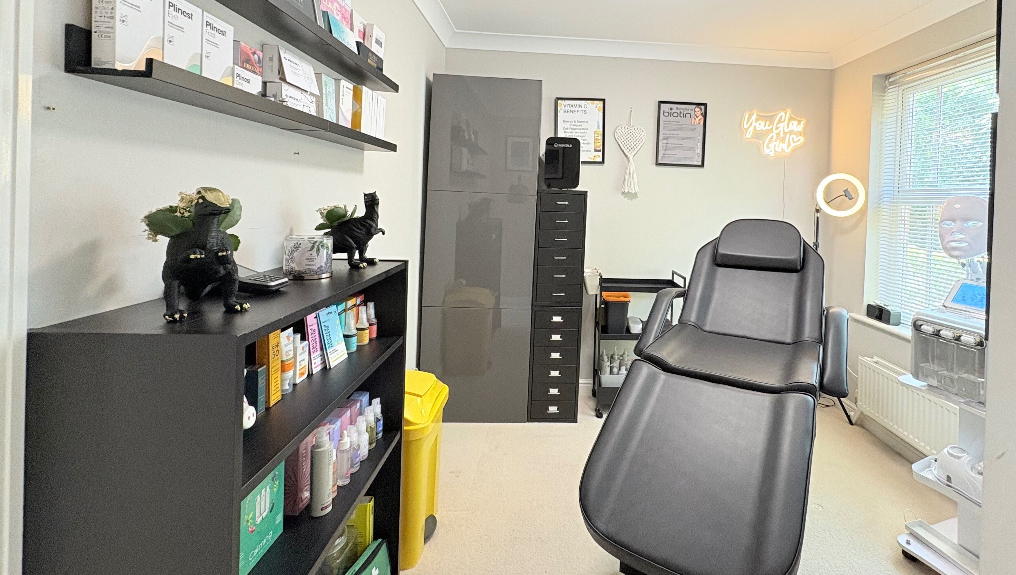 Cozy treatment room at Skinfinity+ in Wokingham, England, GB, showcasing a relaxing atmosphere and modern decor.
