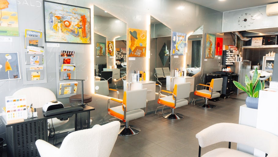 Modern interior of Perception London - Hair & Nail Salon, London, England, GB, featuring stylish salon chairs.