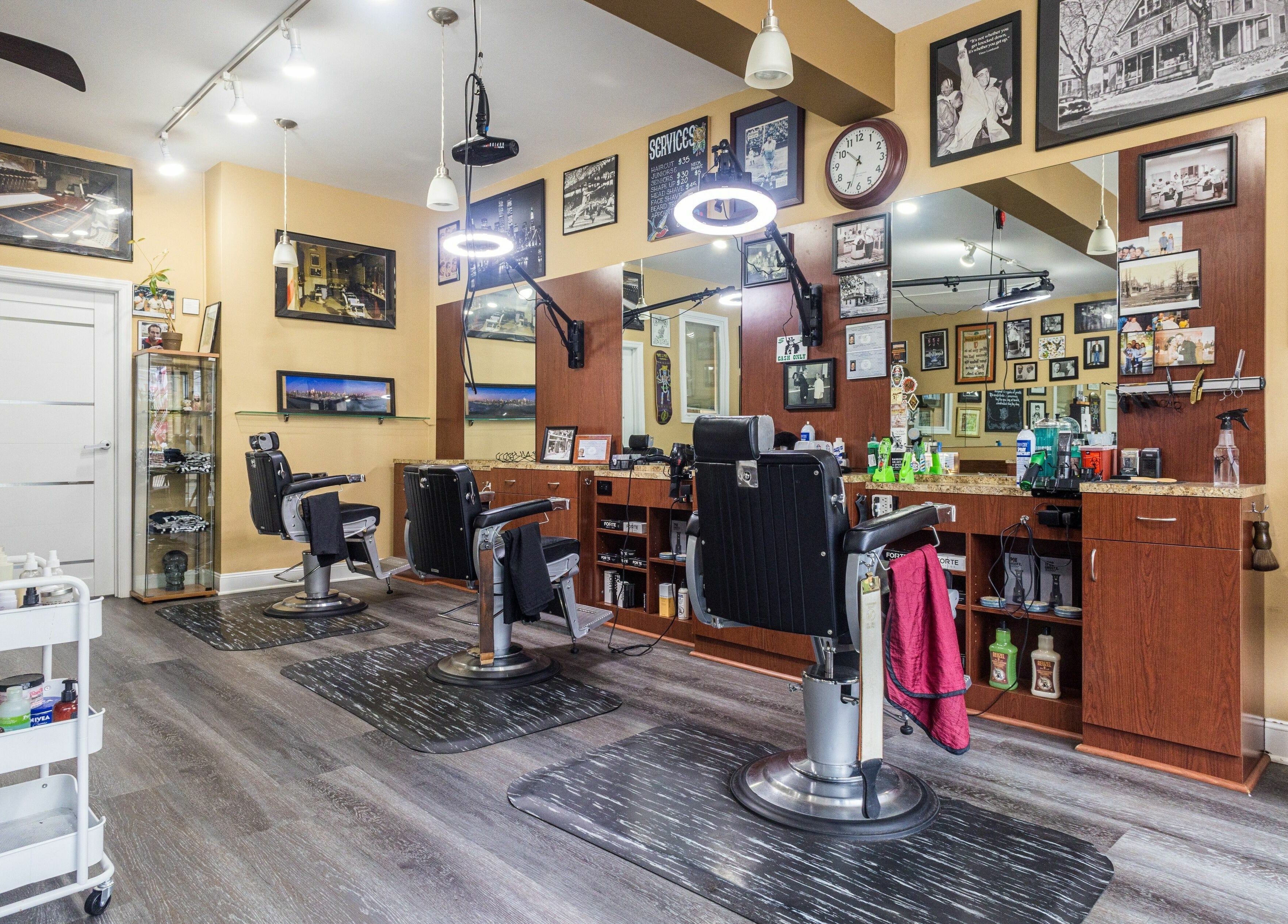 Interior of Empire State Barbershop in Tappan, New York, US with vintage decor and modern barber chairs.