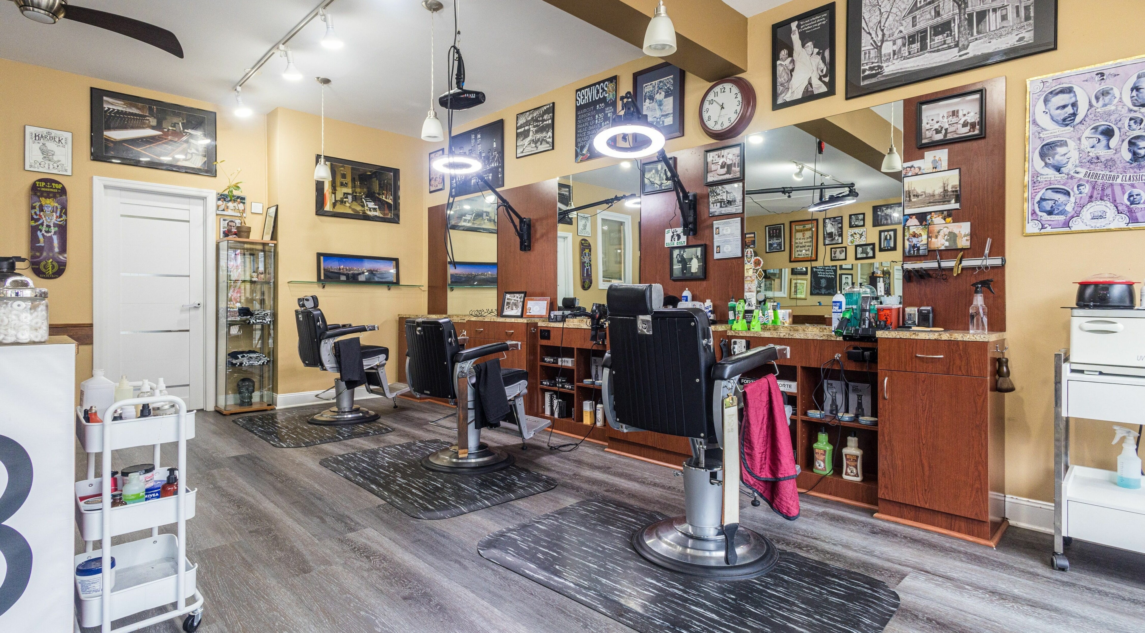 Interior of Empire State Barbershop in Tappan, New York, US with vintage decor and modern barber chairs.