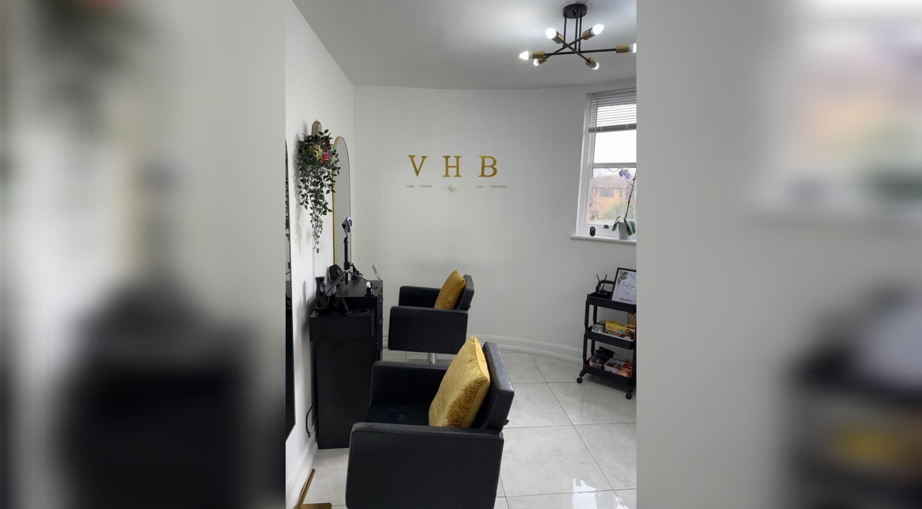 Elegant salon chairs and decor at Venture Hair & Beauty in Chelmsford, England, GB.
