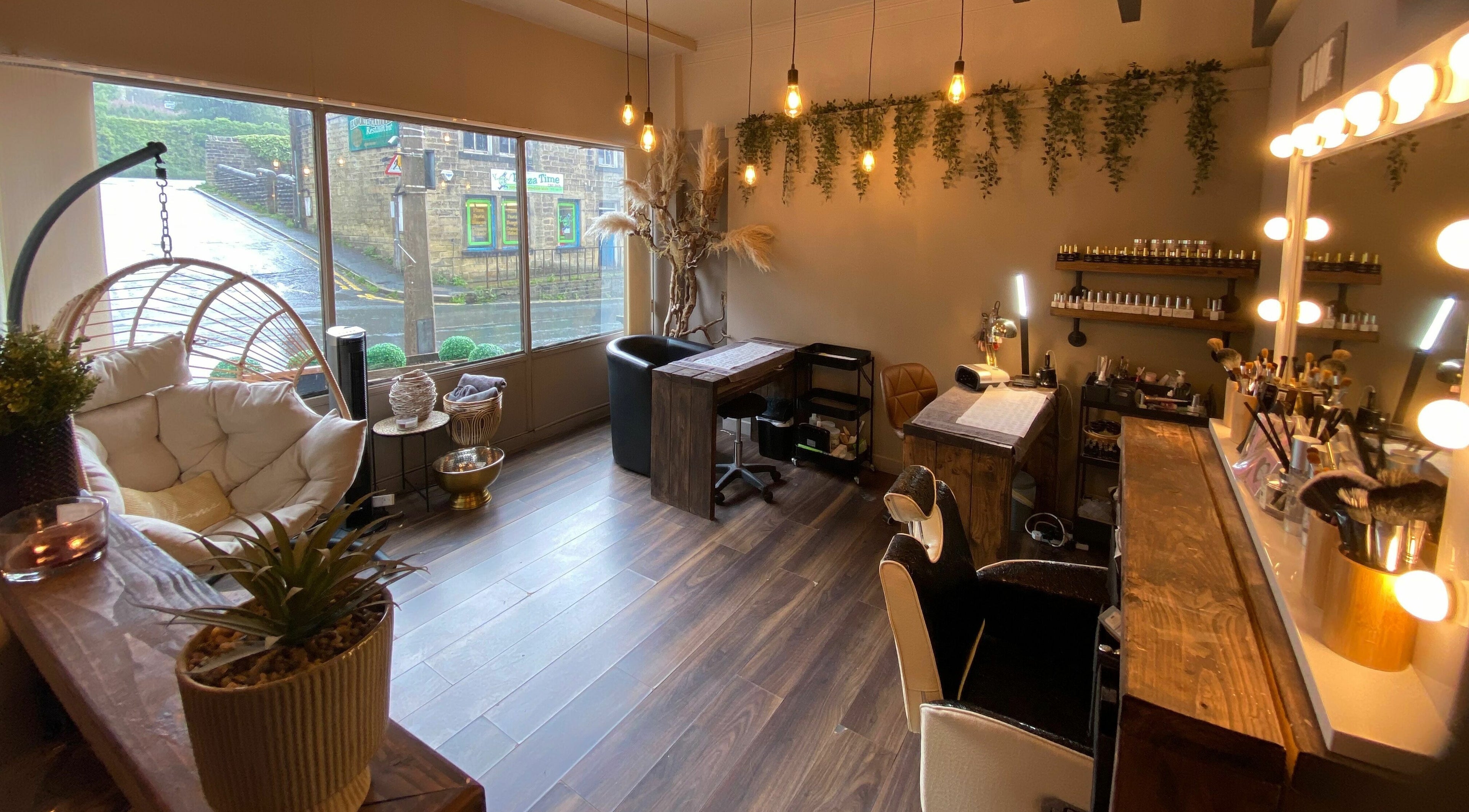 Elegant interior of Haworth Beauty in Haworth, England, GB with rustic decor and cozy seating.