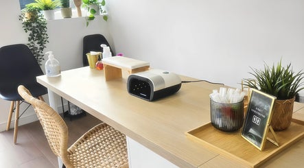 Chic nail station at Babe Cave, Birkenhead, England, GB, featuring modern decor and nail equipment.