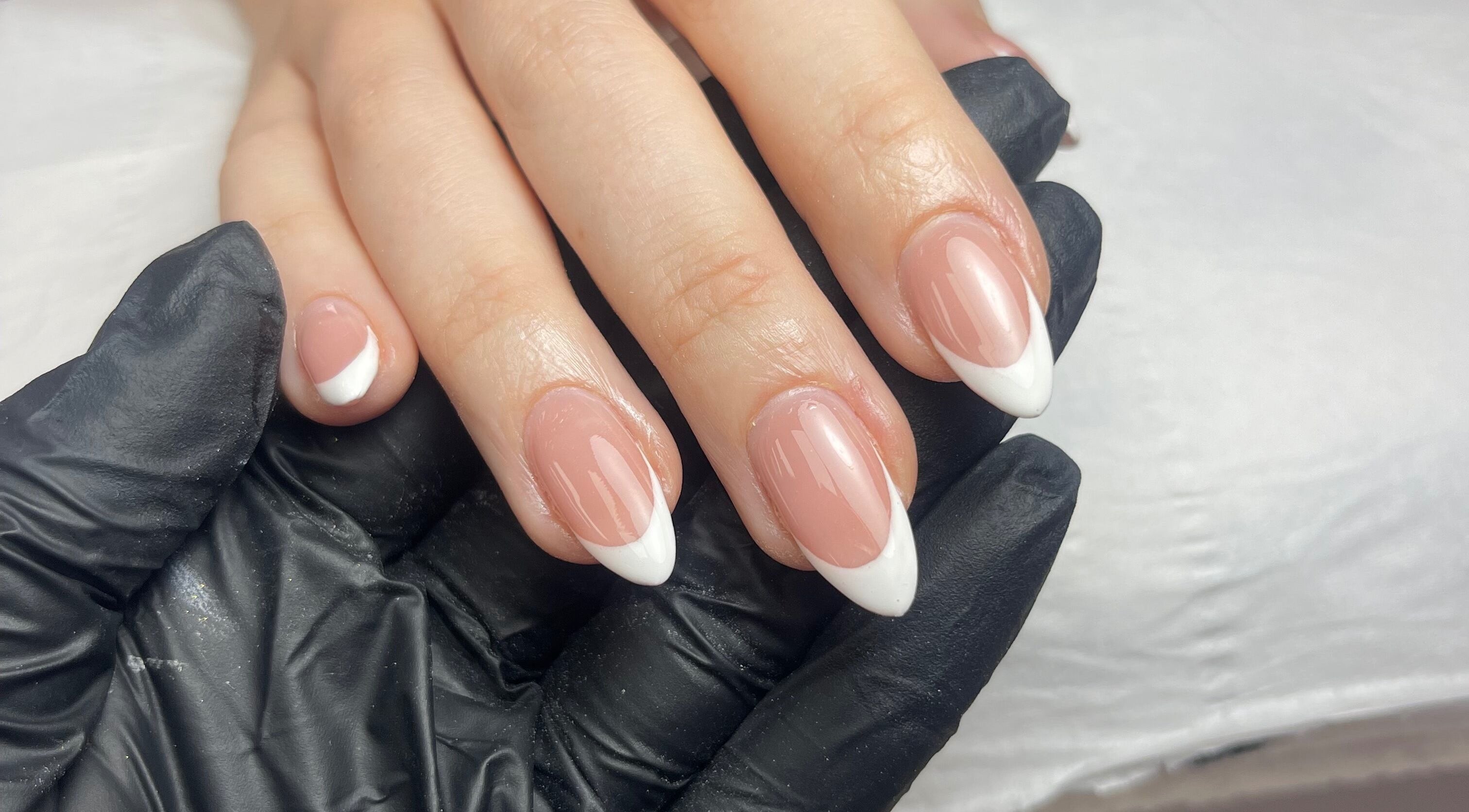 Classic French Manicure done at LKD Beauty Bar in Gateshead, England, GB. Featuring clean, polished nails.