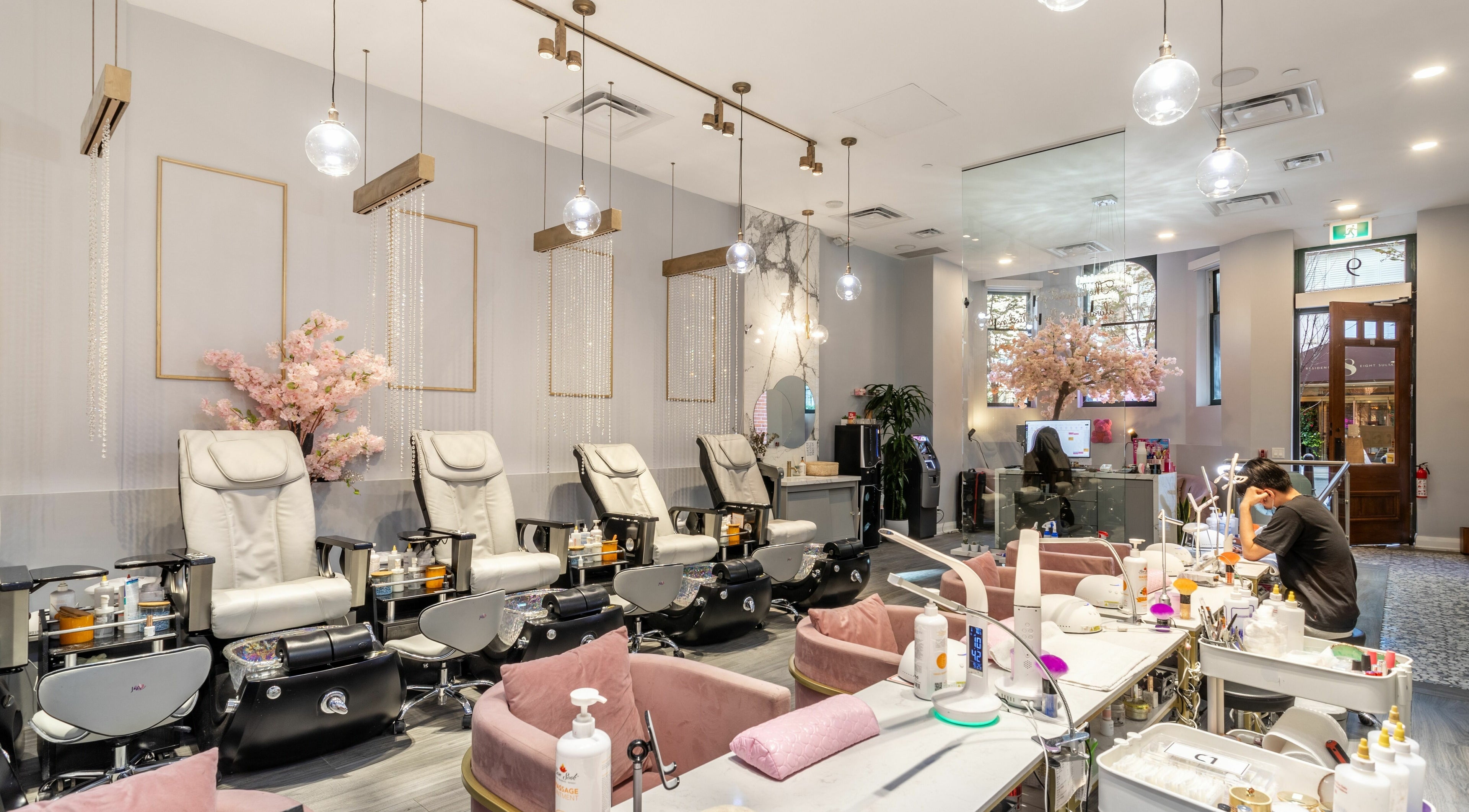 Relaxing interior of Tokyo Nails and Spa in Toronto, Ontario, CA featuring plush chairs and elegant decor.