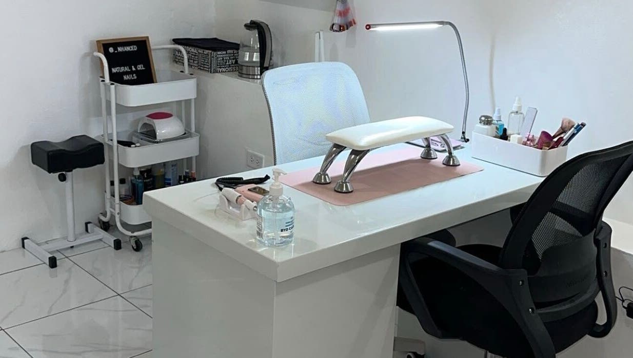 Nhanced nail station in Bridgetown, Saint Thomas, BB with sleek white decor and manicure tools.