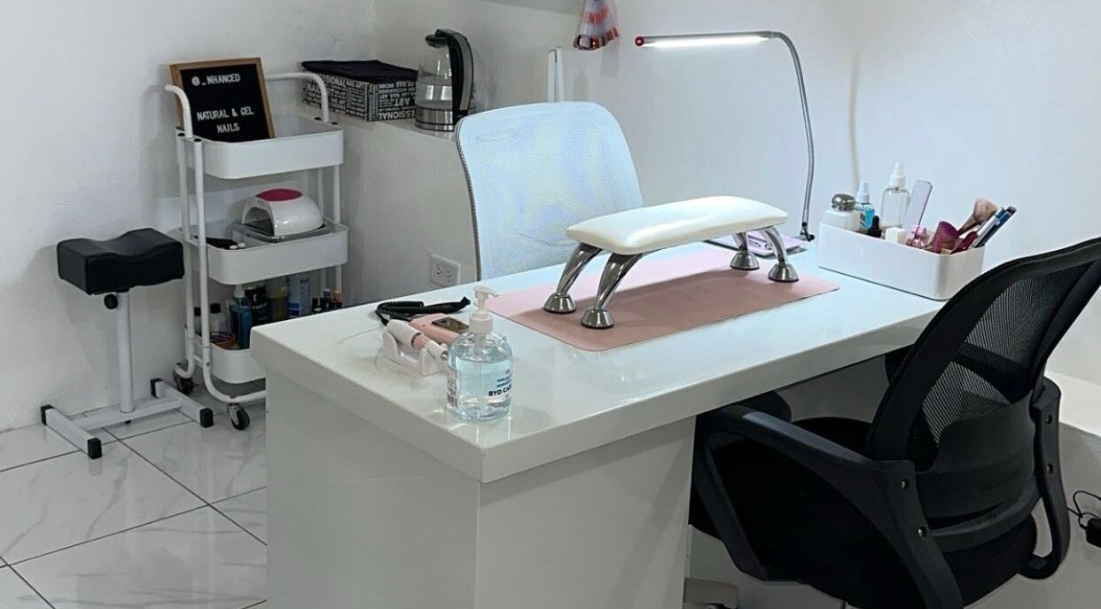 Nhanced nail station in Bridgetown, Saint Thomas, BB with sleek white decor and manicure tools.