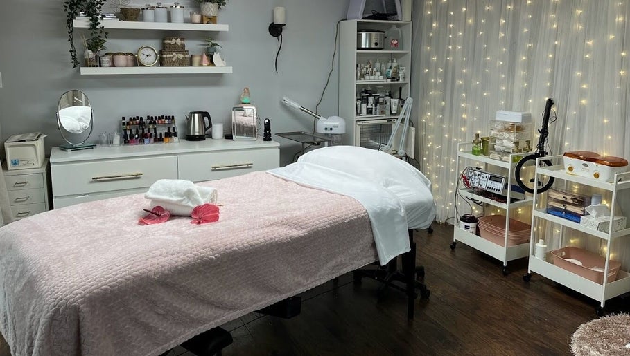 Relaxing treatment room at Bountiful Beauty Lounge, Bountiful, Utah, US, with cozy decor and warm lighting.