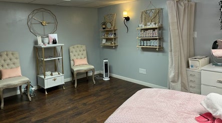Elegant interior of Bountiful Beauty Lounge, featuring plush chairs and soft lighting in Bountiful, Utah, US.