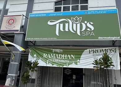 Front view of Tulip Spa and Beauty Seri Iskandar in Seri Iskandar, Perak, MY with green signage and festive banners.