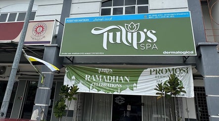 Front view of Tulip Spa and Beauty Seri Iskandar in Seri Iskandar, Perak, MY with green signage and festive banners.