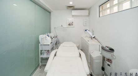 Calm, modern treatment room at PERFECTA Laser - Body - Beauty Surry Hills, New South Wales, AU.