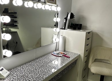 Modern vanity with lit mirror at Pixy Beauty, Stafford, England, GB. Perfect for beauty and wellness.