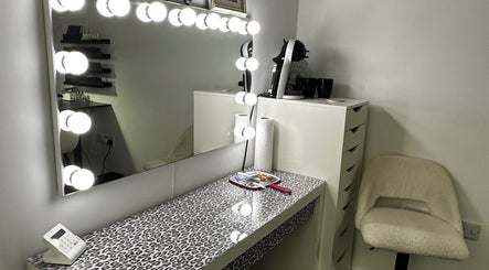 Modern vanity with lit mirror at Pixy Beauty, Stafford, England, GB. Perfect for beauty and wellness.
