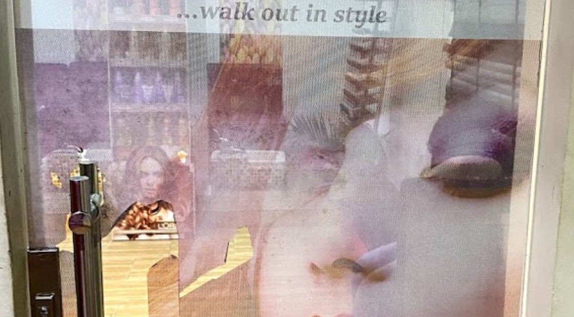 Entrance of Studio Strands in Lagos, Lagos, NG with stylish decor and products displayed.