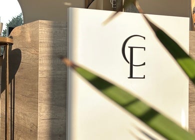 Reception desk with CE logo at Clare Elizabeth Colour & Styling Studio, Wirral, England, GB.