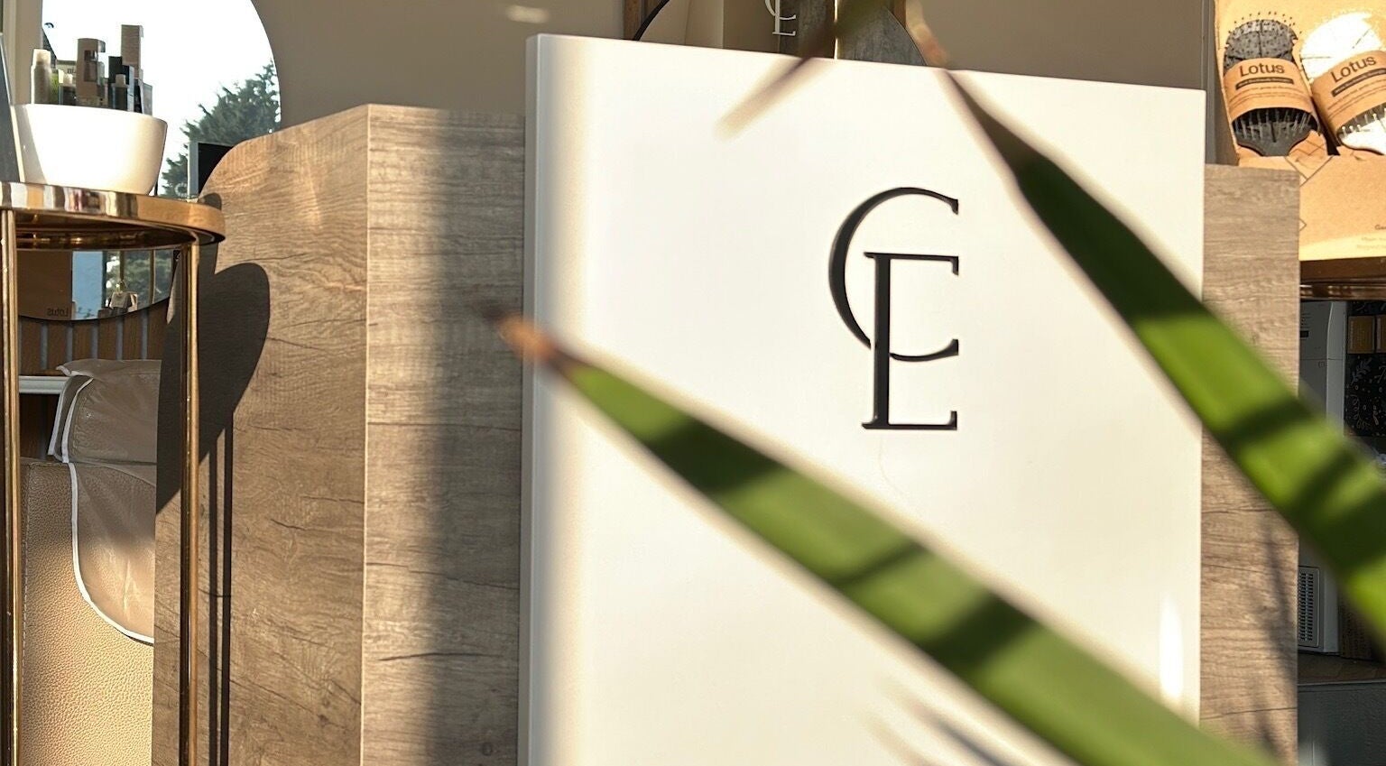 Reception desk with CE logo at Clare Elizabeth Colour & Styling Studio, Wirral, England, GB.