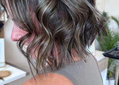 Close-up of wavy hairstyle at Clare Elizabeth Colour & Styling Studio, Wirral, England, GB.