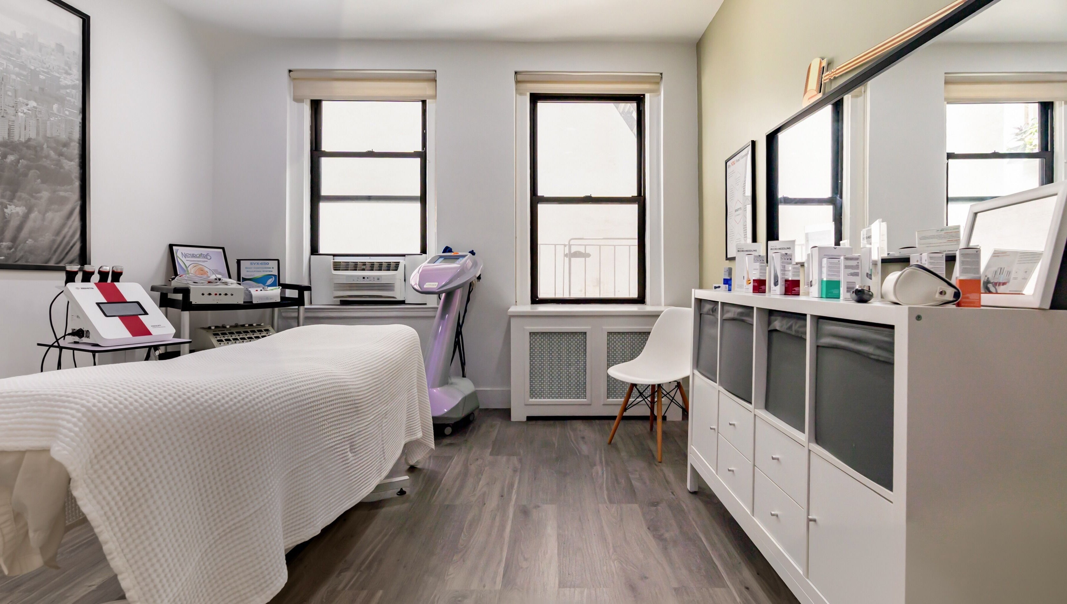 Cozy treatment room at The Renew Anti-Aging Center, New York, New York, US, with elegant decor and skincare equipment.